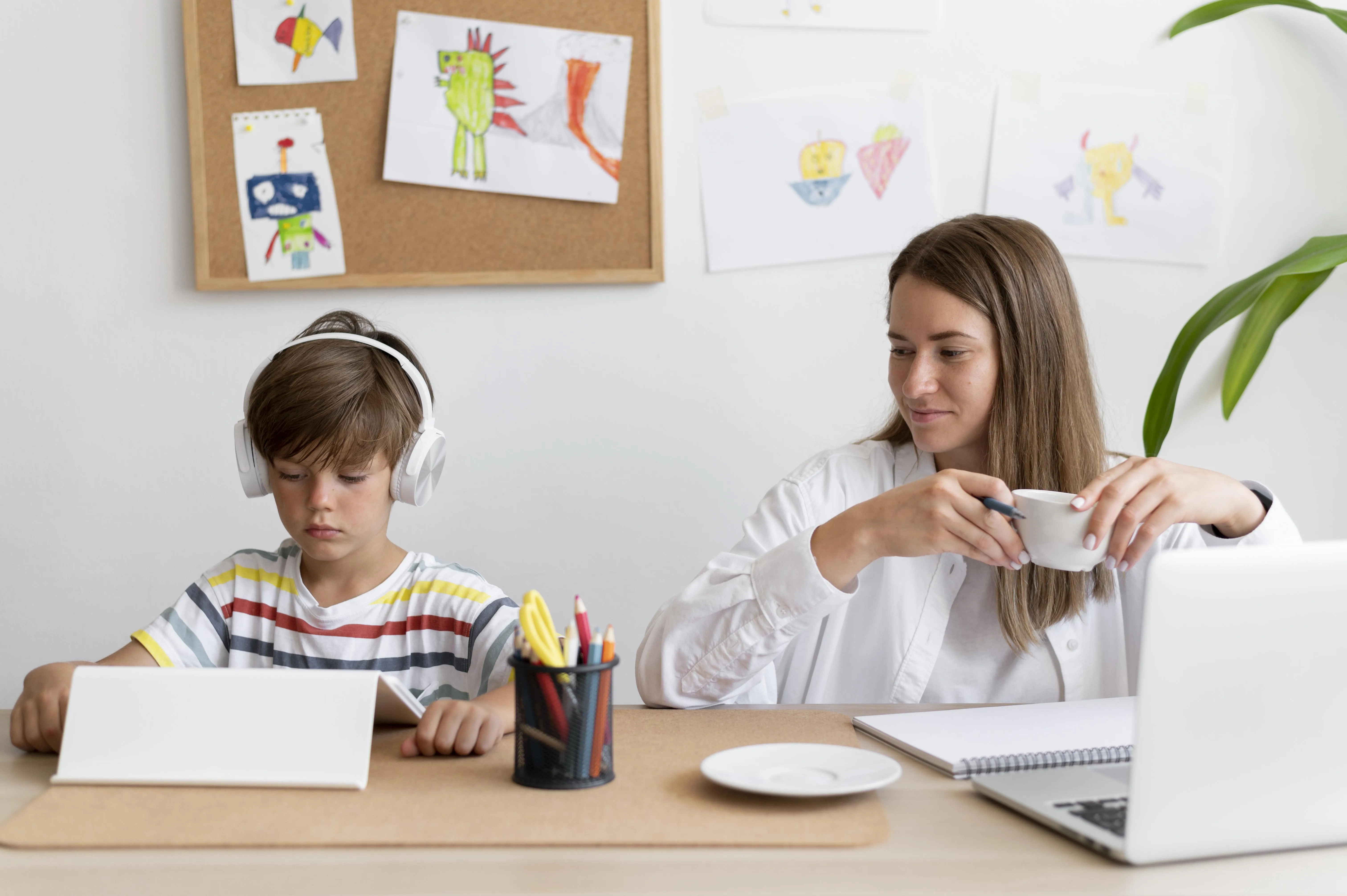 Person using AAC device to communicate independently and express complex thoughts
