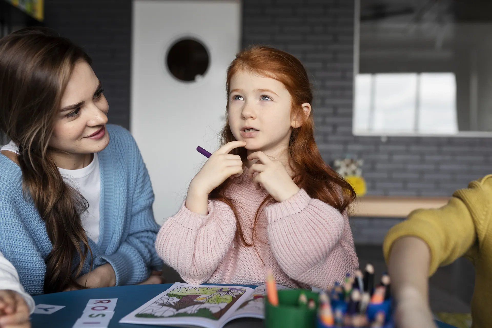 Child confidently interacting with peers and building friendships through improved communication