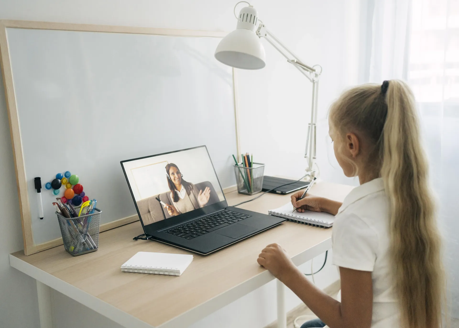 Therapist conducting remote assessment with digital tools